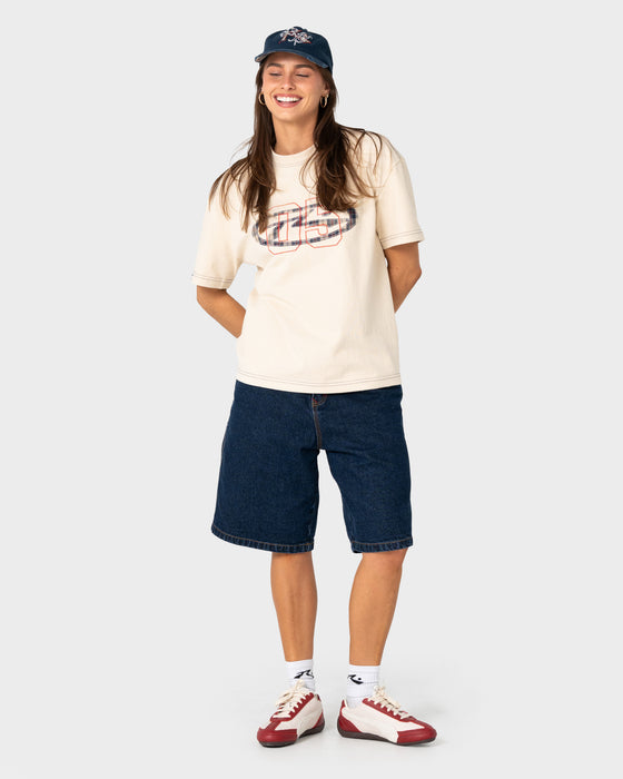 model-wearing-rusty-x-five-by-flynn-cap-in-navy-blue