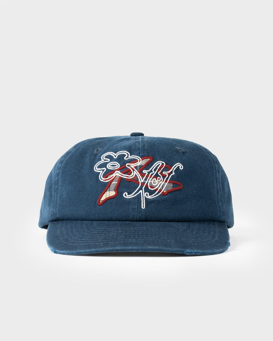 model-wearing-rusty-x-five-by-flynn-cap-in-navy-blue