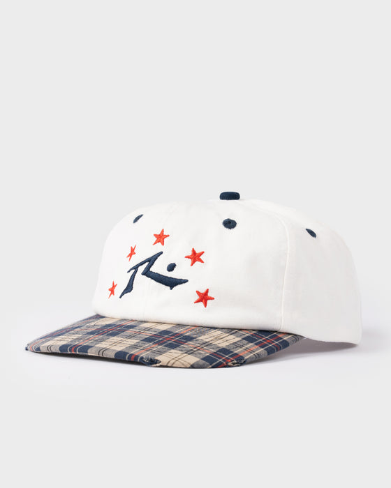 model-wearing-rusty-x-five-by-flynn-cap-in-plaid