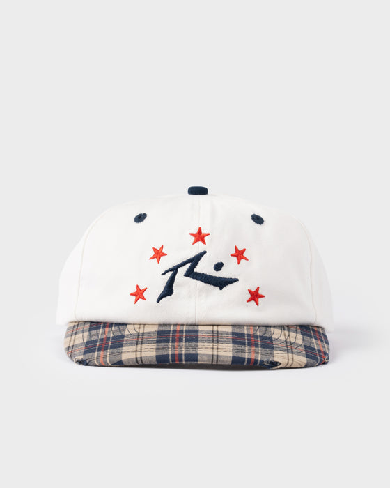 model-wearing-rusty-x-five-by-flynn-cap-in-plaid