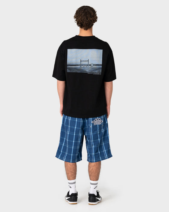 model-wearing-king-waves-kill-short-sleeve-tee-in-black