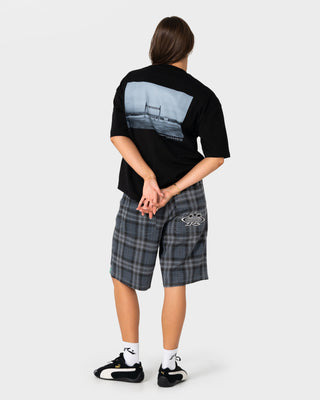 Model wearing King Waves Kill Short Sleeve Tee in Black