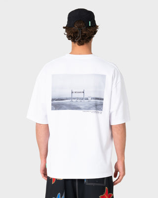 Model wearing King Waves Kill Short Sleeve Tee in White