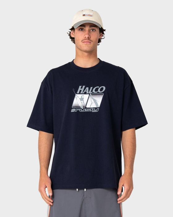 man-wearing-rusty-x-halco-short-sleeve-tee-in-navy-blue