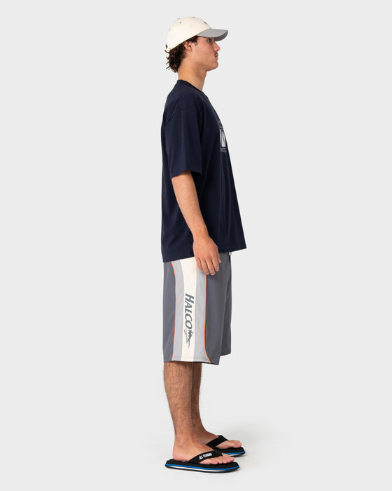 man-wearing-rusty-x-halco-short-sleeve-tee-in-navy-blue