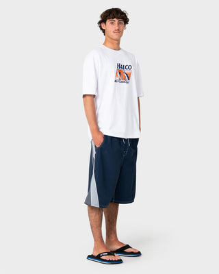 Man wearing Rusty x Halco Short Sleeve Tee in White