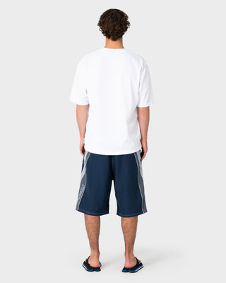 Man wearing Rusty x Halco Short Sleeve Tee in White
