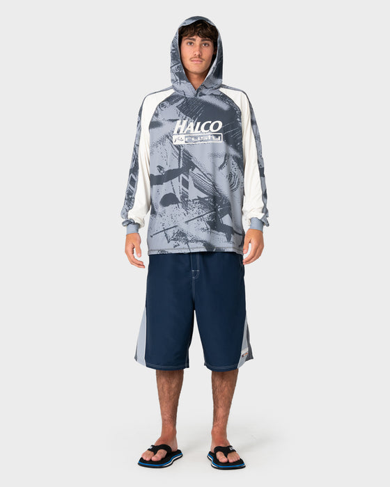 man-wearing-rusty-x-halco-long-sleeve-hooded-tee-in-stone-grey