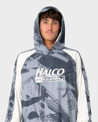 Man wearing Rusty x Halco Long Sleeve Hooded Tee in Stone Grey