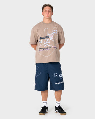 Man and women wearing BTV Graphic Tee in Mushroom