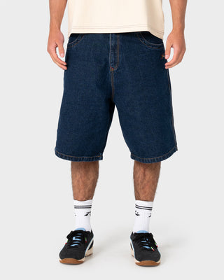 Model wearing Flip Flynn Baggy Jort in Indigo