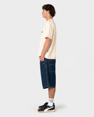 Model wearing Flip Flynn Baggy Jort in Indigo