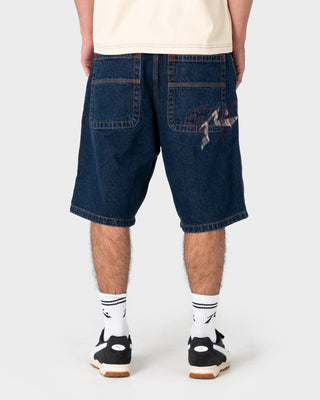 Model wearing Flip Flynn Baggy Jort in Indigo