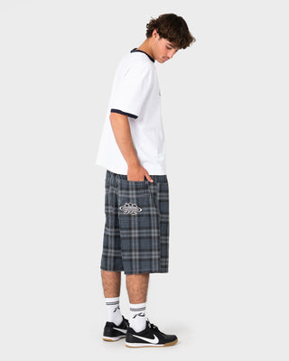 Model wearing Flop Drop Elastic Baggy Walkshort in Navy Blue