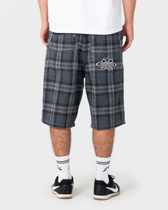 model-wearing-flop-drop-elastic-baggy-walkshort-in-navy-blue