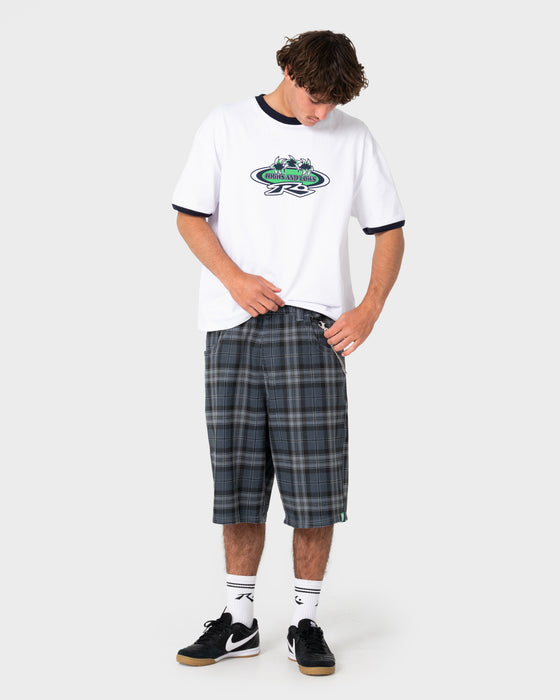 model-wearing-flop-drop-elastic-baggy-walkshort-in-navy-blue