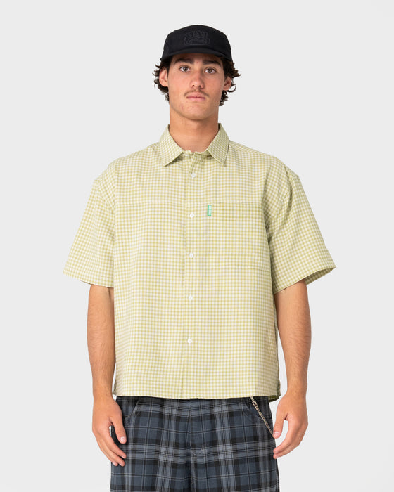 model-wearing-two-squared-short-sleeve-shirt-in-sage