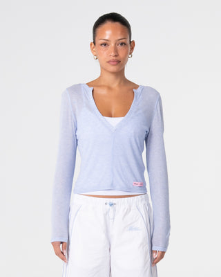 Woman wearing Henry Henley Long Sleeve Top in Sail Blue