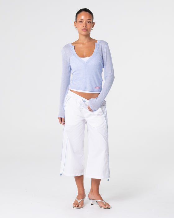 woman-wearing-henry-henley-long-sleeve-top-in-sail-blue