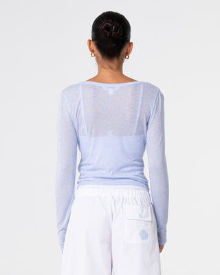 Woman wearing Henry Henley Long Sleeve Top in Sail Blue