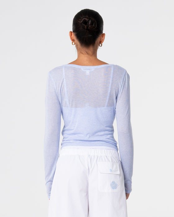 woman-wearing-henry-henley-long-sleeve-top-in-sail-blue
