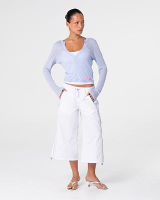 Woman wearing Henry Henley Long Sleeve Top in Sail Blue