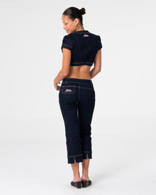 Woman wearing Muse Me Denim Bolero Top in Raw Dawg Blue
