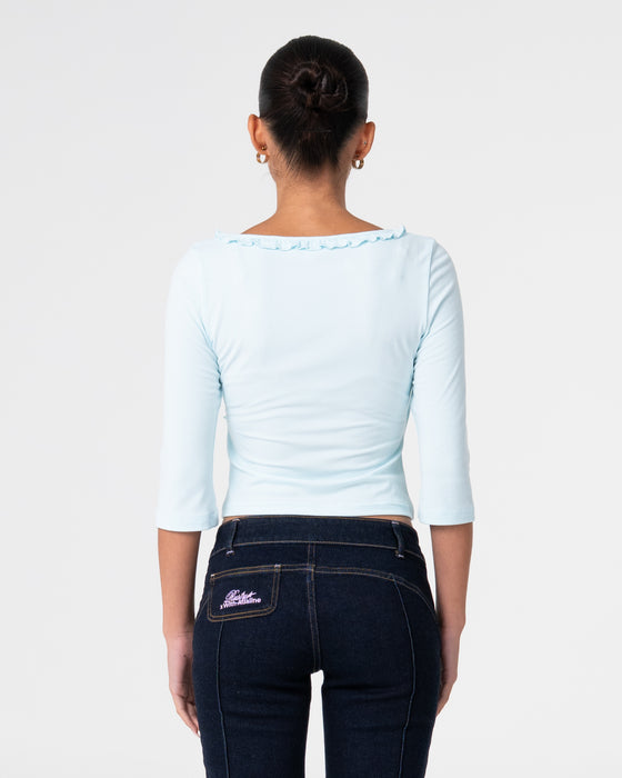woman-wearing-naomi-deep-vee-3-4-sleeve-top-in-pale-mint
