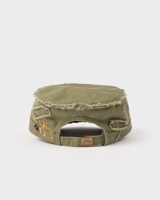 Woman wearing Zoe Military Cap in Savanna