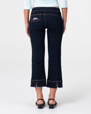 Woman wearing Muse Me Kick Capri Jean in Raw Dawg Blue