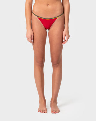 Woman Wearing Howzit Midi Bikini Bottom in Red / Khaki