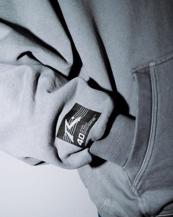 man-wearing-heritage-hoodie-in-washed-grey