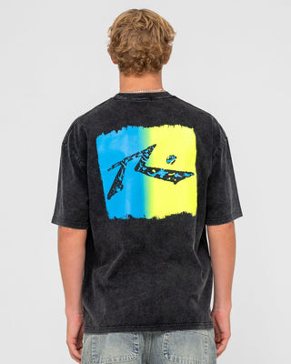 Man wearing Technicolour Tee in Washed Black