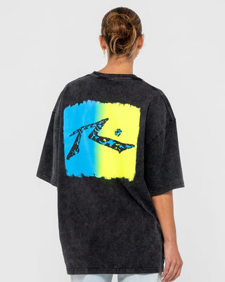 Man wearing Technicolour Tee in Washed Black