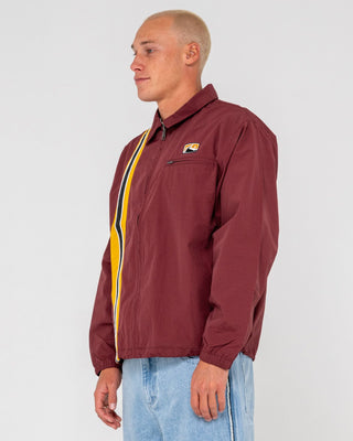 Man wearing Concealer Shell Jacket in Burgundy