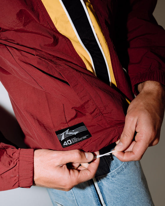 man-wearing-concealer-shell-jacket-in-burgundy