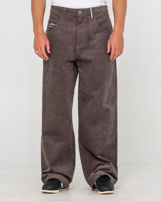 Man wearing Big Wale Corduroy Pant in Dark Choc