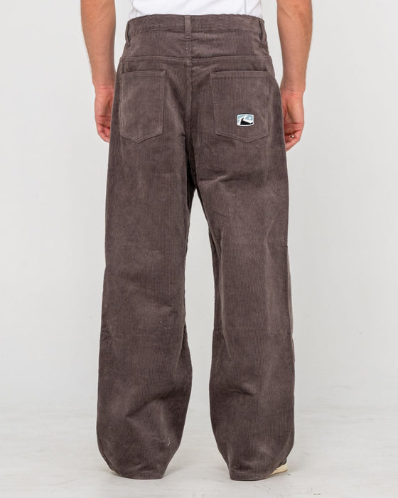 man-wearing-big-wale-corduroy-pant-in-dark-choc