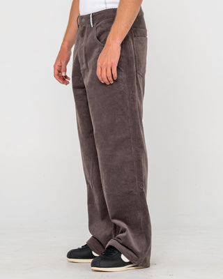 Man wearing Big Wale Corduroy Pant in Dark Choc