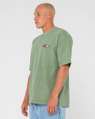 Man wearing Sleds N Threads Short Sleeve Tee in Oil Green