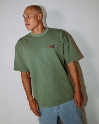 Man wearing Sleds N Threads Short Sleeve Tee in Oil Green