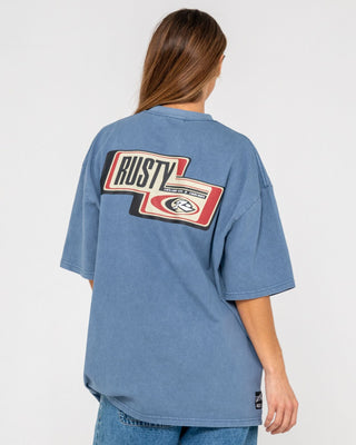 Man wearing Sleds N Threads Short Sleeve Tee in Real Teal