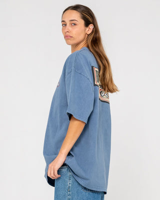 Man wearing Sleds N Threads Short Sleeve Tee in Real Teal