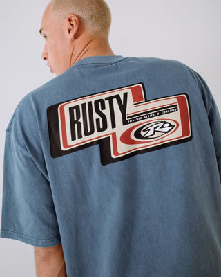 Man wearing Sleds N Threads Short Sleeve Tee in Real Teal