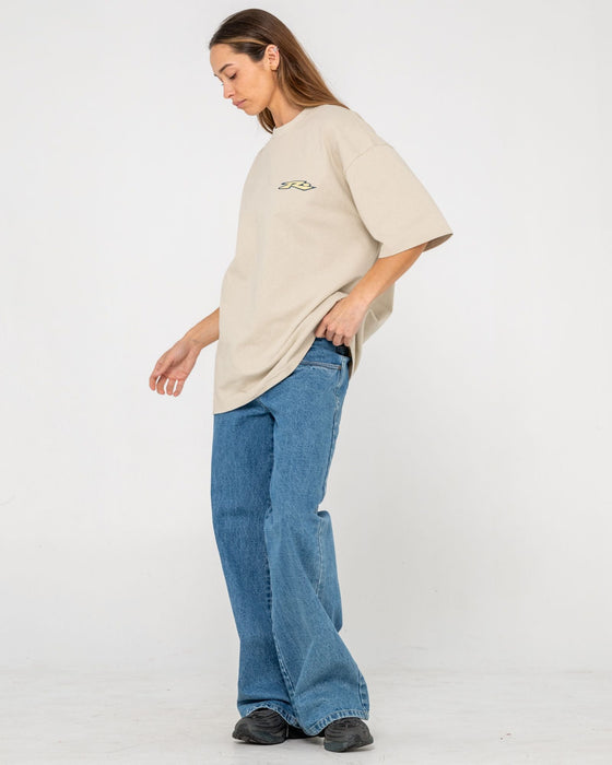 man-wearing-surfing-co-short-sleeve-tee-in-stone