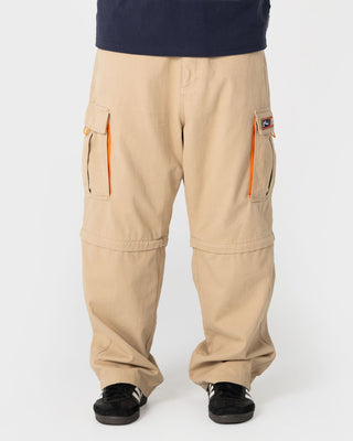 Man wearing Megatron 00 Baggy Zip Off Cargo Pant in Abbey Stone