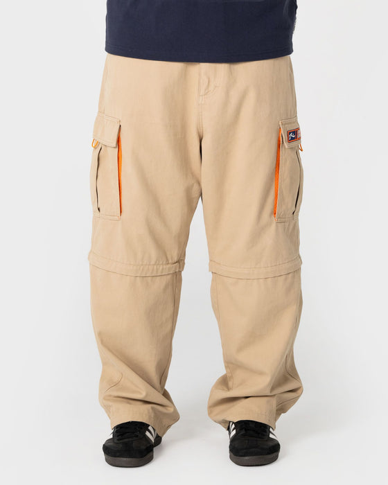 man-wearing-megatron-00-baggy-zip-off-cargo-pant-in-abbey-stone
