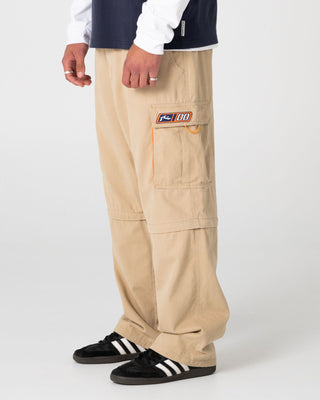 Man wearing Megatron 00 Baggy Zip Off Cargo Pant in Abbey Stone