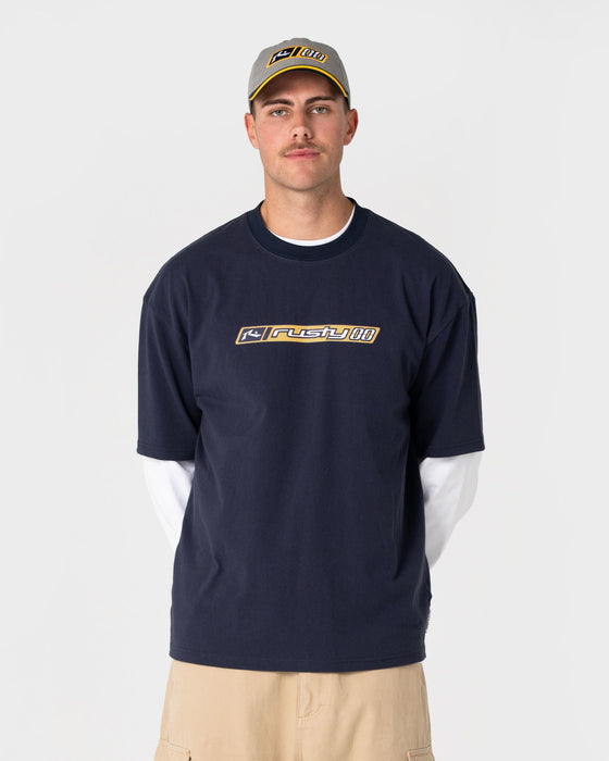 man-wearing-millennium-short-sleeve-tee-in-dark-blue