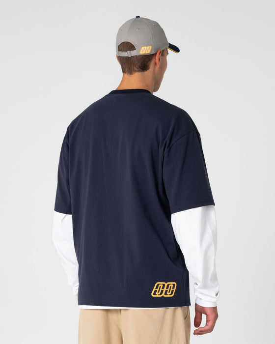 man-wearing-millennium-short-sleeve-tee-in-dark-blue